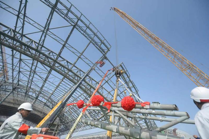 新国展二期项目主体结构完工,施工亮点全在这